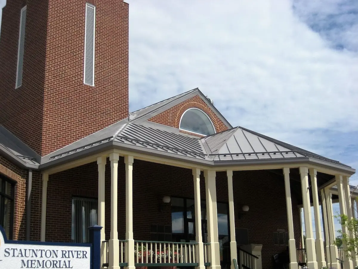 Skilled roofing craftsmen working on a residential roof in Vidalia